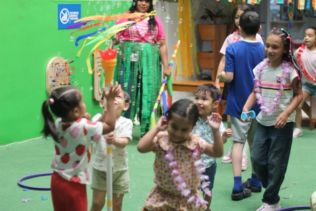 Petrolera children playing with ribbons