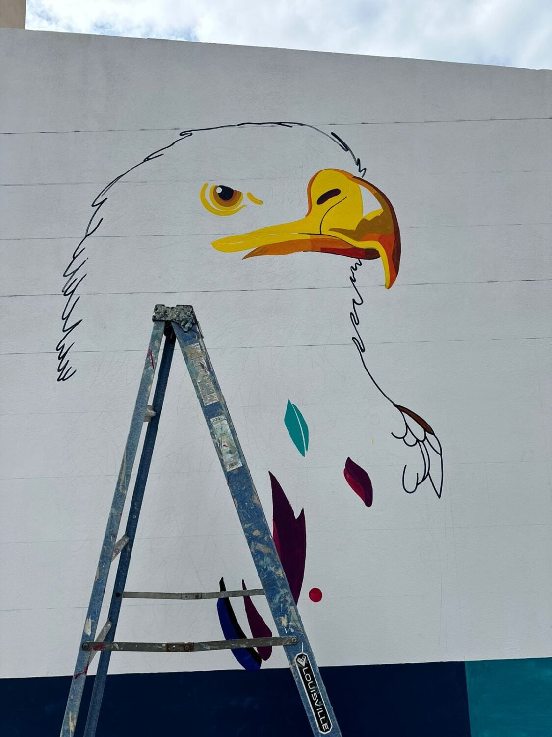 The eagle mural taking shape on a Vista Hermosa wall